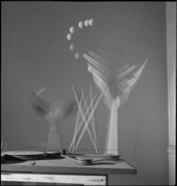 Alexander Calder (1898–1976), Dancers and Sphere (maquette for 1939 New York World's Fair) set in motion in Calder's "small shop" New York City storefront studio, 1938.  © 2017 Calder Foundation, New York / Artists Rights Society (ARS), New York.  Photograph by Herbert Matter, courtesy Calder Foundation, New York 