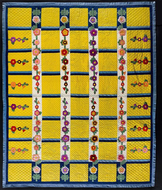 HOLLY HOCKS QUILT by Eva G.  Rex (dates unknown) United States.  Dated 1944.  Cotton 96 x 81".  American Folk Art Museum, New York, gift of Cyril Irwin Nelson, 2004.14.5.