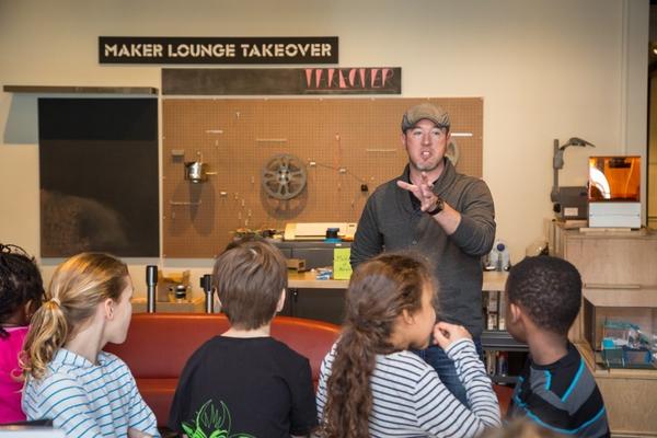 Ryan White working with students from Salem’s Phoenix School at PEM.