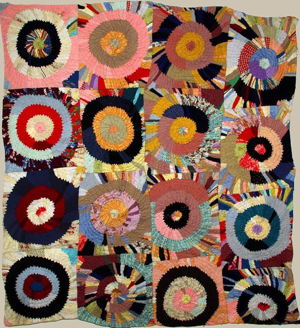 ‘TARGETS’ VINTAGE PIECED QUILT- circles of folded layered triangles resembling a Sonia Delauney.