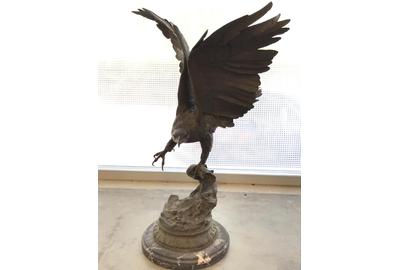 The top lot of the auction was this Jules Moigniez signed bronze eagle statue that fetched $3,840.