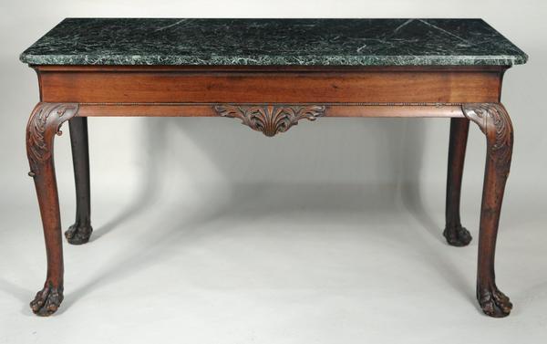 A rare Georgian marble top carved mahogany serving table brought $40,800 at Woodbury Auctions on June 8, 2014.