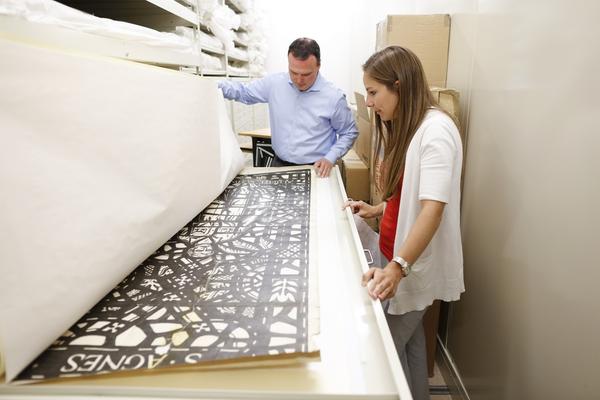 Browsing the collection of the Rakow Library at The Corning Museum of Glass, image courtesy of The Corning Museum of Glass