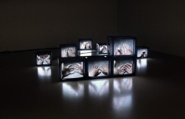 The Hand, 2002 (film still), Melik Ohanian.  9 monitors, 9 videos (4 min 21), sound, text, edition of 3 + 2 AP.  Courtesy of the artist and Galerie Chantal Crousel, Paris, © Melik Ohanian / ADAGP PARIS, 2017.  Philadelphia Museum of Art, Gift of Mari and Peter Shaw, 2016.