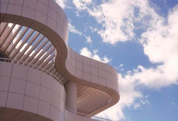 Abstract of Piano Curve against blue sky and clouds.  Photo: Alex Vertikoff.  ©2003 J.  Paul Getty Trust