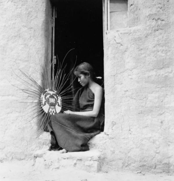 Hopi basket weaver, photographer unknown.