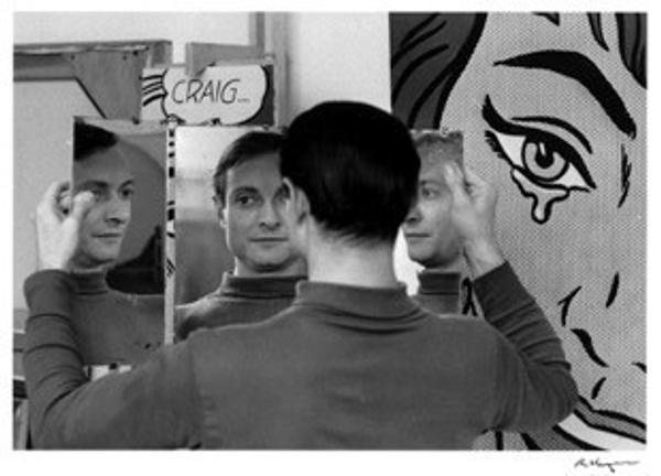 Roy Lichtenstein in front of his paintings Craig… (1964) and Happy Tears (1964) in his West 26th Street studio, NY, 1964.  Art: © Estate of Roy Lichtenstein.  Photograph: © Ken Heyman.  Courtesy The Roy Lichtenstein Foundation 