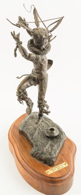 Beautiful bronze sculpture of a kachina dancer in motion by William Klesert (Tucson, Ariz.), #10 of 30, 11.25 inches tall on a swivel wood stand (est.  $1,000-$2,000).