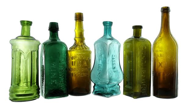 American Bottle Auctions’ Auction #67 will feature the Ken Fee collection of mostly Western bitters bottles, to include a rare blue Cassin’s Grape Brandy Bitters bottle (fourth from left).  