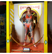 Custom sculpted, 68-inch-tall character portraying Krystyne Kolorful – who had 95 percent of her body surface tattooed, with a “Most Tattooed Lady” PVC sign (est.  $1,000-$2,000).