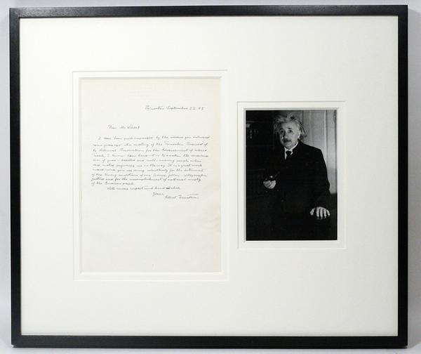 The letter is handsomely matted and framed, with a photo of Einstein.  It’s also one of the few letters Einstein hand-wrote in English.  German was his preferred tongue.