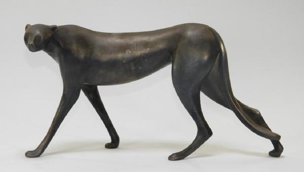 Sleek .999 silver sculpture of a cheetah, 14.5 inches in length, by the Dutch-American artist Loet Vanderveen (1921-2015), titled Stalking Cheetah ($3,750).