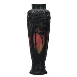 Blown-out vase signed Daum Nancy with marvelous Black Forest detail, 17 ½ inches tall, having an orange and yellow mottled ground with green transitioning to black cameo cut back overlay.