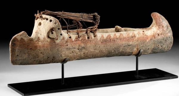 Rare Ancient Egyptian Pre-Dynastic (Naqada II to Naqada III, circa 3500-3000 BCE) terracotta canoe-form boat model with pinched keel, 19in long.  Published in 1909 reference ‘The Light of Egypt,’ by Robert de Rustafjaell, who found the relic at Gebelein, 17 miles from Luxor.  Extensive provenance, including Sotheby’s London, January 20-24, 1913.  Estimate $40,000-$50,000