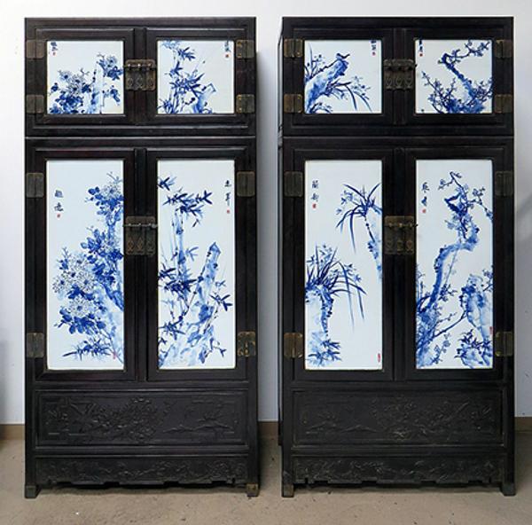 Pair of antique Chinese zitan and porcelain wardrobes, each panel decorated with bamboo and birds, two Chinese characters and the artist's red seal.