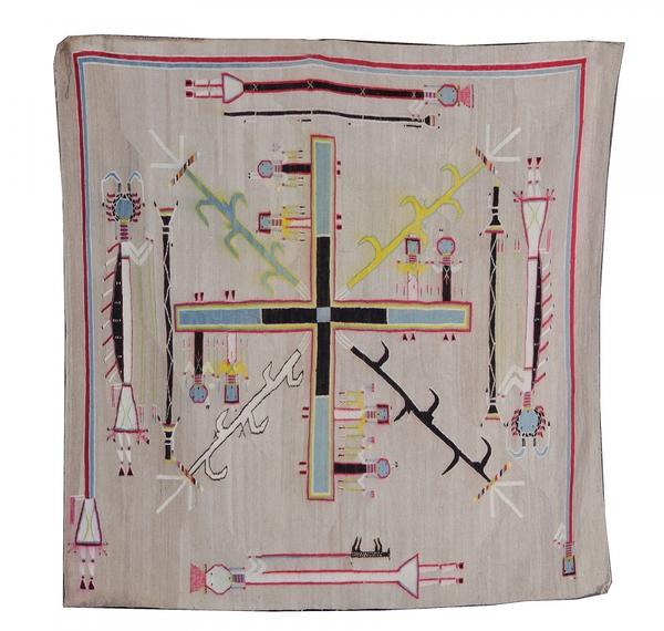 Spectacular Navajo pictorial weaving, a sand-painting example in the Whirling Log design, circa 1925 (est.  $18,000-$25,000).