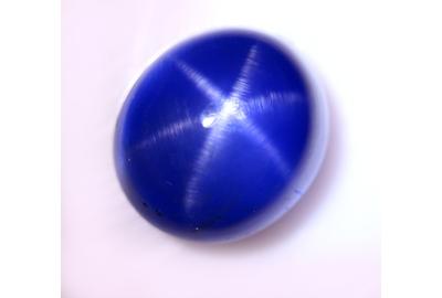 Lot 49: A Oval Cabochon Standard Cut Natural Blue Star Sapphire