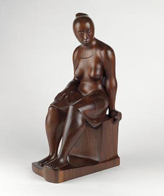 Elizabeth Catlett, Seated Woman, carved mahogany, 1962.  Estimate $100,000 to $150,000.