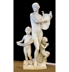 Carved marble grouping of a young woman playing a lyre harp with two children at her side, by Albert Weinert (Am., 1863-1947), 78 inches tall, signed and dated 1924 (est.  $40,000-$80,000).