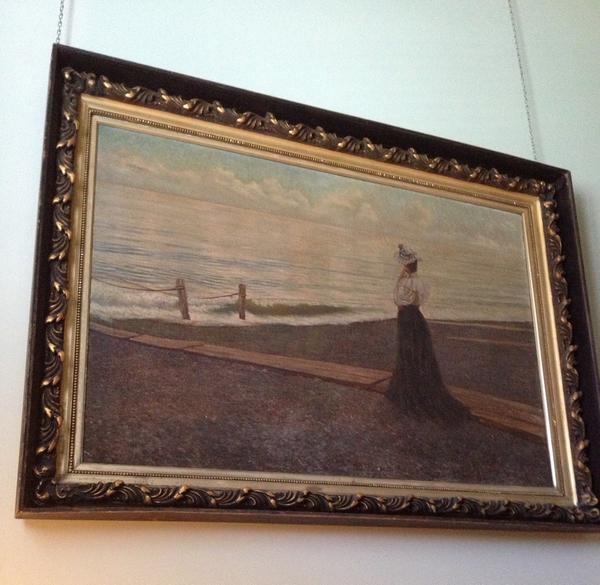 Large oil on canvas done in the manner of Winslow Homer (Am., 1836-1910), 50 inches by 75 inches, depicting a lady at a New England seashore, nicely framed, with museum labels on back.  