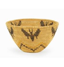 Panamint woven basket with a lovely butterfly pattern, made in Southern California in the early 20th century, 4 inches by 7 inches (est.  $1,000-$1,500).