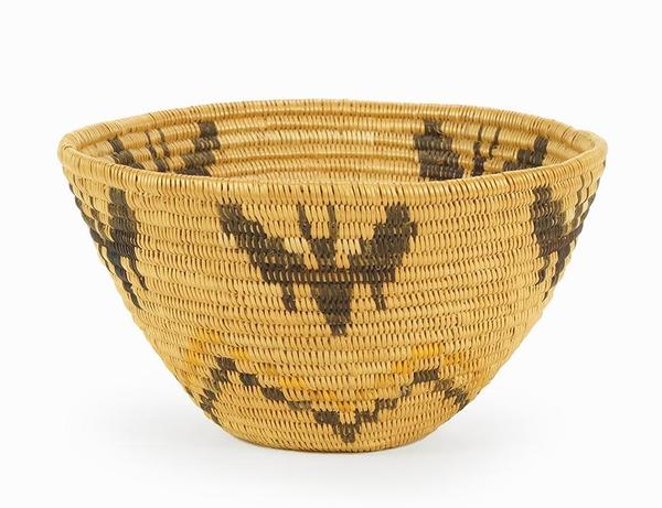 Panamint woven basket with a lovely butterfly pattern, made in Southern California in the early 20th century, 4 inches by 7 inches (est.  $1,000-$1,500).