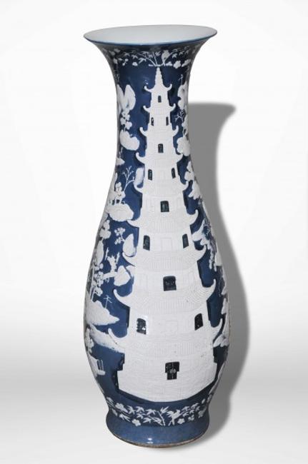 Monumental Chinese porcelain vase made around 1870 with lovely pate-sur-pate pagoda decoration (est.  $10,000-$15,000).