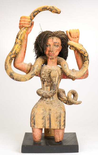 Fine Old African Mami Wata Figure.  Carved and paint decorated wood with raffia.  Collection of Allan Stone, New York.  Size: 30.5'' x 19'' x 8.5'' (77 x 48 x 22 cm).