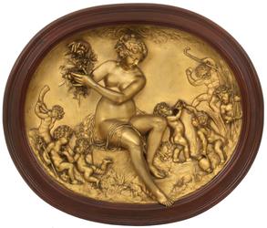 Relief-decorated wall plaque, oval, unsigned, with an autumn harvest scene and an allegorical nude figure of Demeter, 23.75 inches by 28.75 inches (est.  $7,500-$12,500).