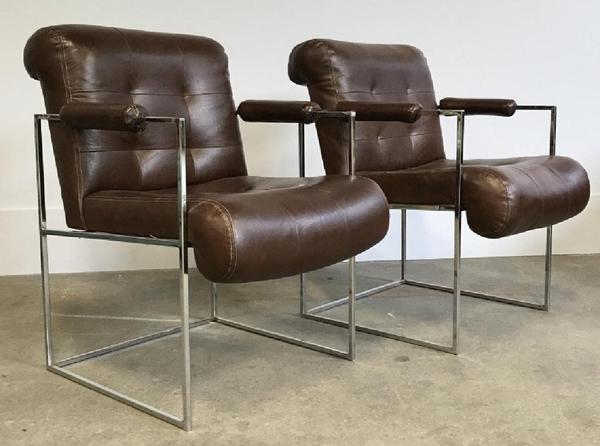 A pair of Milo Baughman for Thayer Coggin Thin Line chrome armchairs was designed in a dark brown vinyl upholstery mimicking leather, 32 by 23 by 29 inches ($300-600).  