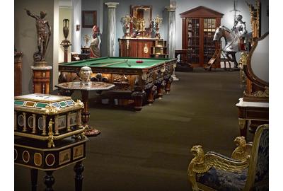 M.S.  Rau Antiques's main gallery space, displaying their varied collection of fine art and antiques.