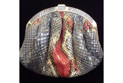 A snakeskin luxury handbag, marked for Florence Manelli, handmade in Italy, with detachable shoulder strap, will cross the block.