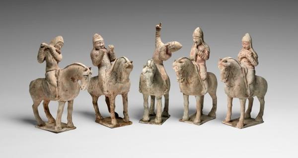 Musicians on Horseback, Tang dynasty (618¬-907), mid-7th century.  Earthenware with traces of pigment.  Height of tallest 12 5/16 inches.  Gift of Charles H.  Ludington from the George Crofts Collection, 1923.