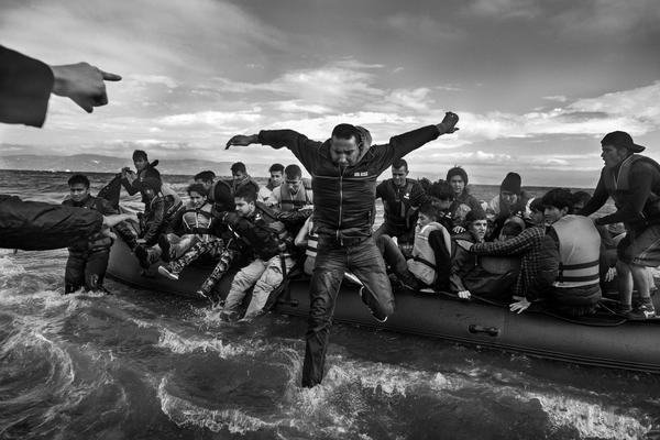 Ashley Gilbertson: Refugees, primarily from Syria, Iraq and Afghanistan, disembark on the island of Lesvos, Greece, 2015 