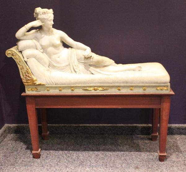 Carved marble sculpture of Pauline Bonaparte as Venus Victrix, from the 19th or 20th century after Antonio Canova (Italian, 1757-1822) on a custom-built wood stand (minimum bid: $3,500).