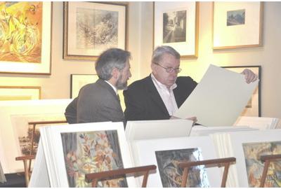 Marc Chabot discusses on of his prints with Clifford Ackley, Curator of Prints, Drawings and Photographs at the Museum of Fine Arts, Boston.  