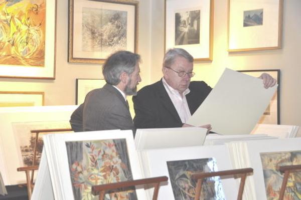 Marc Chabot discusses on of his prints with Clifford Ackley, Curator of Prints, Drawings and Photographs at the Museum of Fine Arts, Boston.  