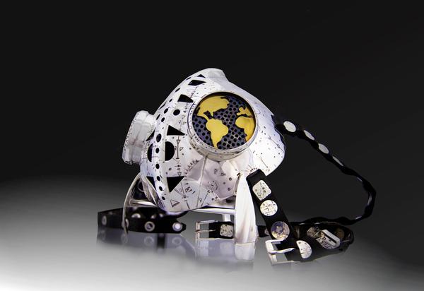 Time Traveler Shamanic Mask by Jason McLeod.  This mask is fully functional, and is 100% hand fabricated from sterling silver, 18k yellow gold, leather, black silk, cotton, and foam rubber.  It features two 600 count cotton removable filters and adjustable leather straps.  World side shown (other side shows Corona of the sun in gold).