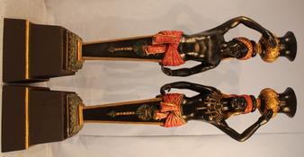 This handsome matched pair of bronze and iron blackamoors, each one 70 inches tall, sold as one lot for $5,175.