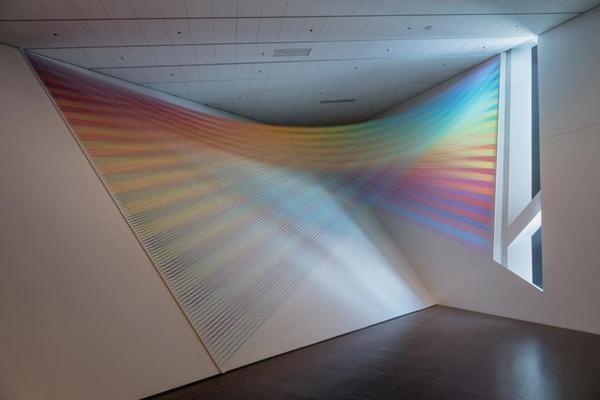 Part of "Mi Tierra" at Denver Art Museum: Gabriel Dawe, Plexus no.  36, 2016.  Gütermann thread, painted wood, and hooks.  © Gabriel Dawe