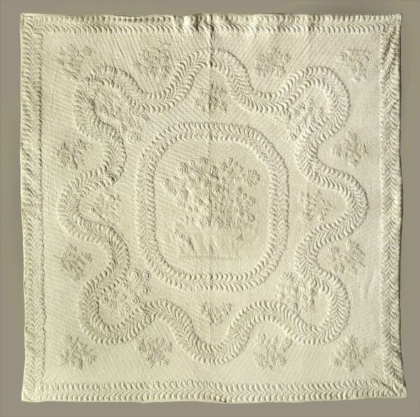 A trapunto white work so-called 'bridal' quilt of extraordinary workmanship