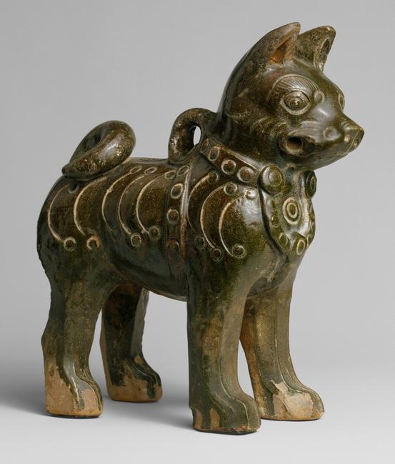 Figure of a dog, China, Eastern Han dynasty, 25–220 A.D.  Earthenware with dark green glaze.  Gift of Stanley Herzman, in memory of, in memory of Adele Herzman, 1991 (1991.253.1) 