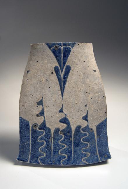 A white slip-glazed flattened vessel with flared base and mouth, with curvilinear decoration in blue overglaze enamel, by Kamoda Shōji (1933-1983)1976, Slip-glazed stoneware, 12 x 9 1/2 x 5 1/2 in.  Photography by Richard Goodbody.  