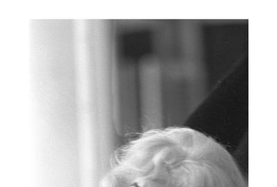 This beautiful candid of Monroe was taken in 1960 behind the scenes of "Let's Make Love"