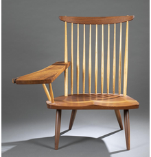 Nakashima lounge chair with free right arm, hickory spindles and a sap walnut seat, signed and dated (2000) beneath the seat, estimate $4,000-$6,000.  