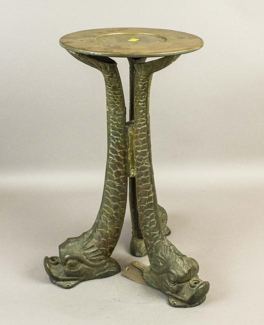 19th century ship's cast-iron binnacle with three decorative legs.