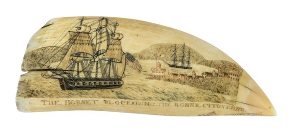 Scrimshaw whale's tooth by the Naval Monument Engraver sold for $396,00 at Eldred's Marine Sale.