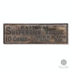 Niagara Falls Railway Suspension Bridge wood sign, 1880s (“travel over and back for 10 cents”), historically significant and 16 inches by 50 ½ inches (est.  $2,500-$4,000).