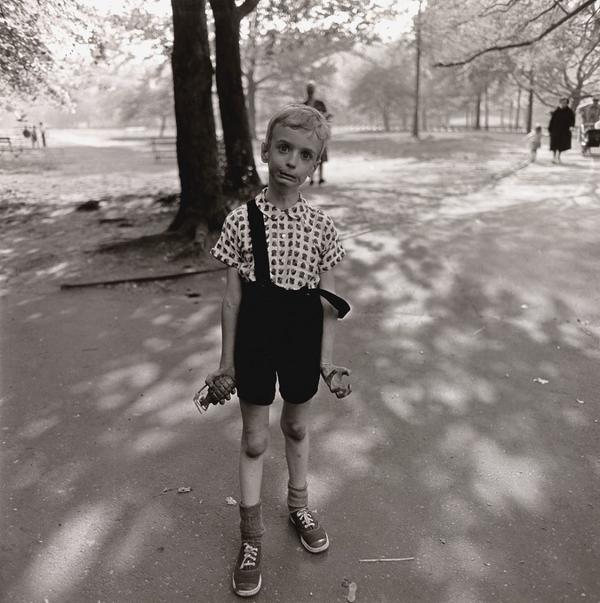 Diane Arbus, American, 1923 – 1971.  Neil Selkirk, American, born England, born 1947.  Child with a toy hand grenade in Central Park, NYC, 1962; printed 1973.  Gelatin silver print.  Image: 14 7/16 × 14 3/8 inches (36.63 × 36.53 cm).  Sheet: 19 15/16 × 15 15/16 inches (50.62 × 40.46 cm).  Gift of the Hall Family Foundation.  2017.24.1