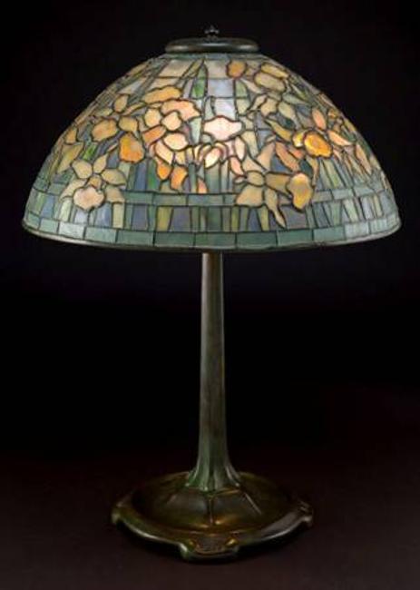 Heritage Auctions’ $1.84 million Lalique & Art Glass Signature® Auction was led by a superb Tiffany Studios Daffodil table lamp that brought $56,763.